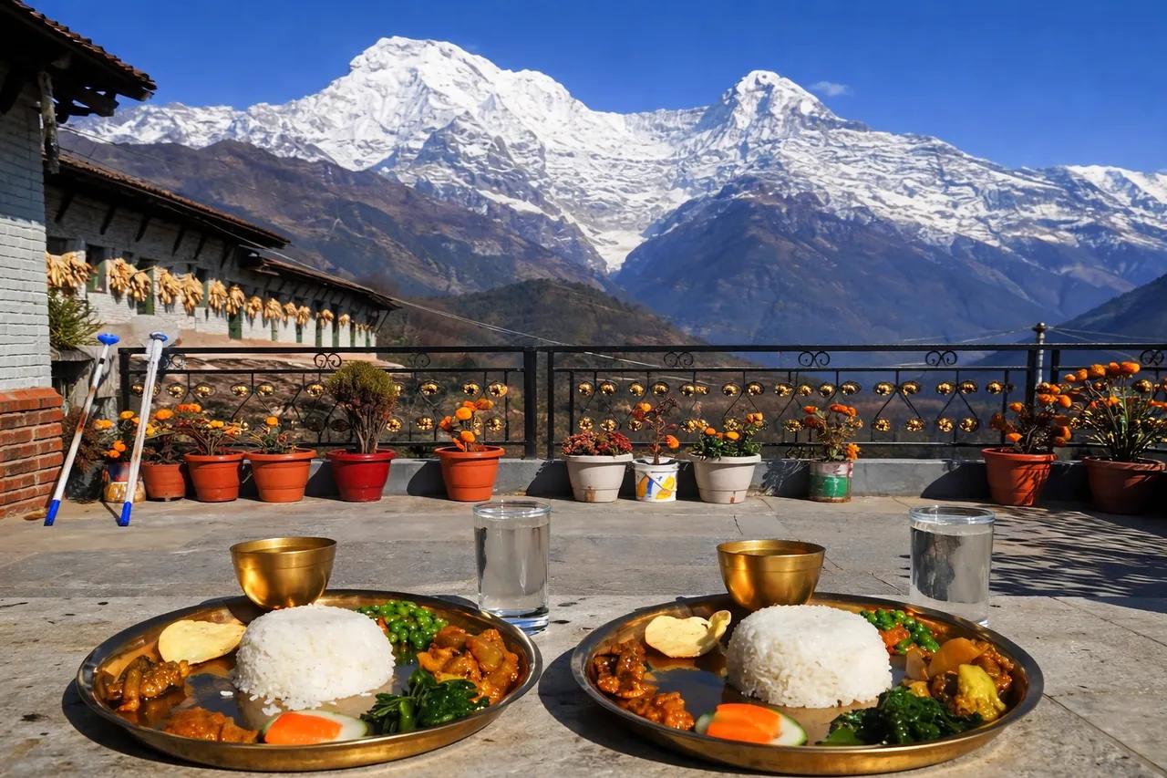 Dal bhat meal served at a tea house on the Annapurna trail with mountain view from the lodge window